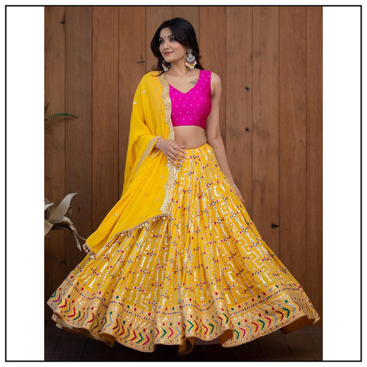 Yellow tapeta silk heavy embroidery work lehenga choli for haldi ceremony