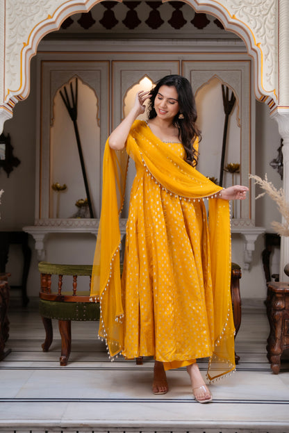 Charm with our exclusive 3-piece Yellow Anarkali Suit