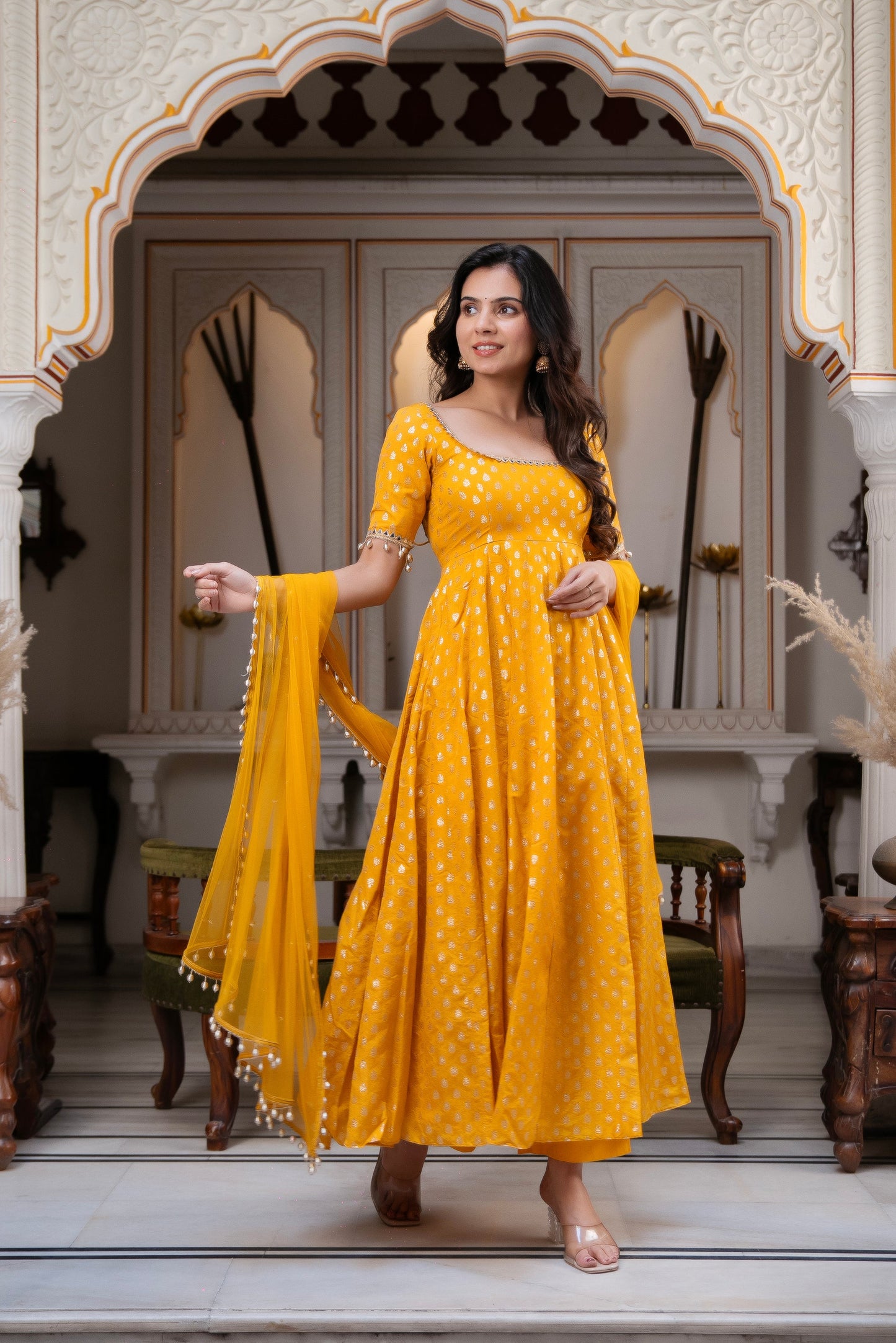 Charm with our exclusive 3-piece Yellow Anarkali Suit
