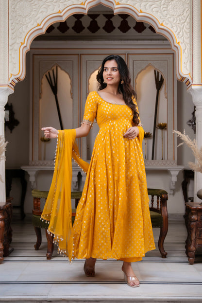 Charm with our exclusive 3-piece Yellow Anarkali Suit