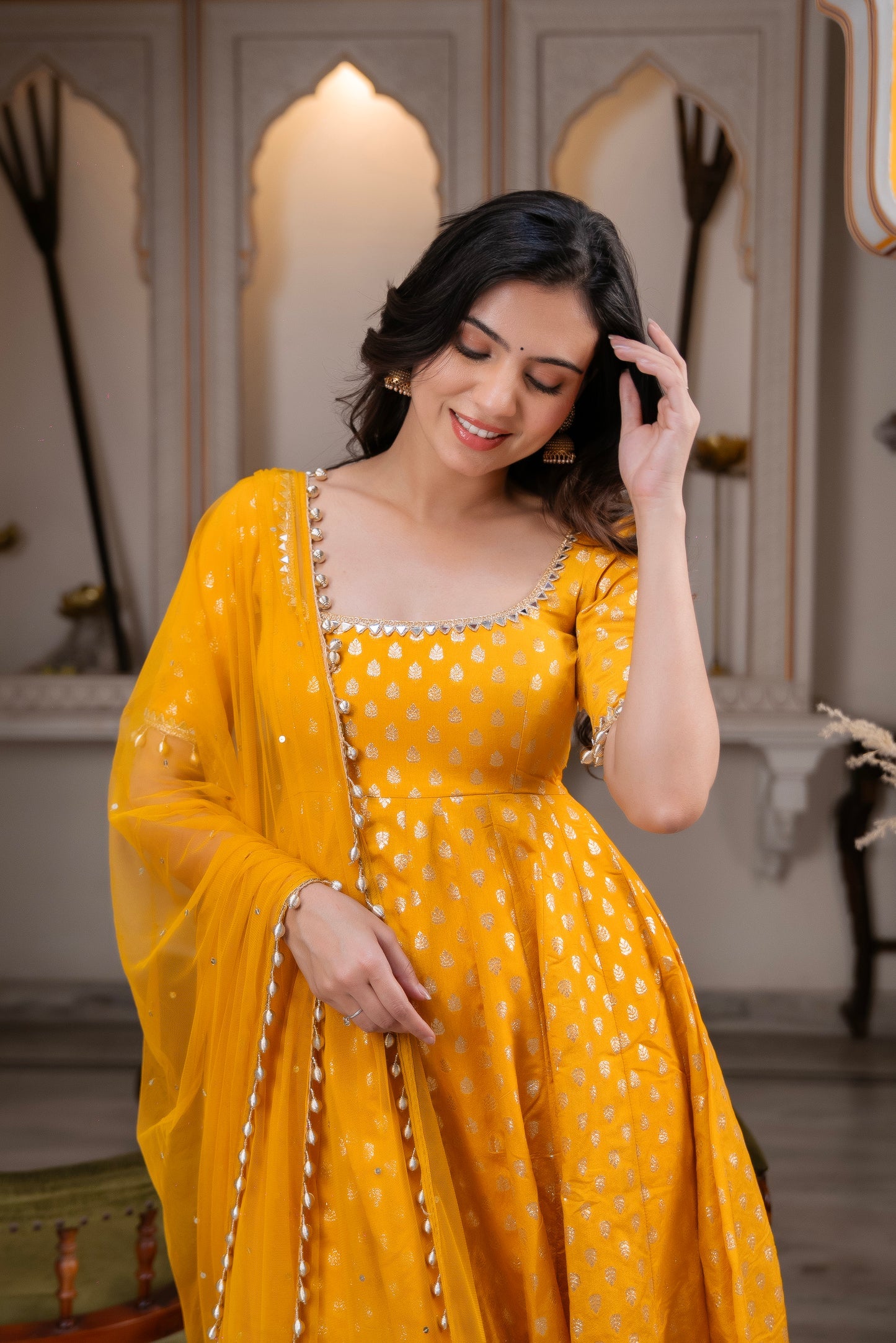 Charm with our exclusive 3-piece Yellow Anarkali Suit