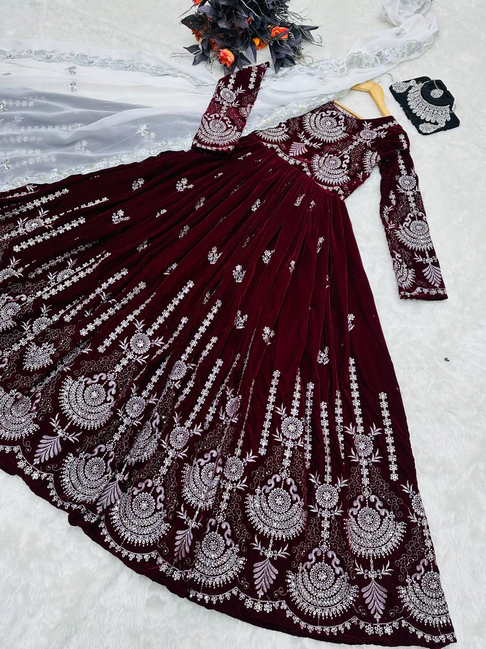 Maroon velvet heavy embroidery worked wedding gown